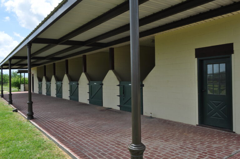 Covered stable row at Le Bocage - clean, secure overnight stalls